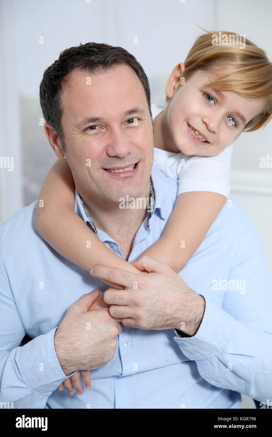 Portrait of father and son Stock Photo - Alamy