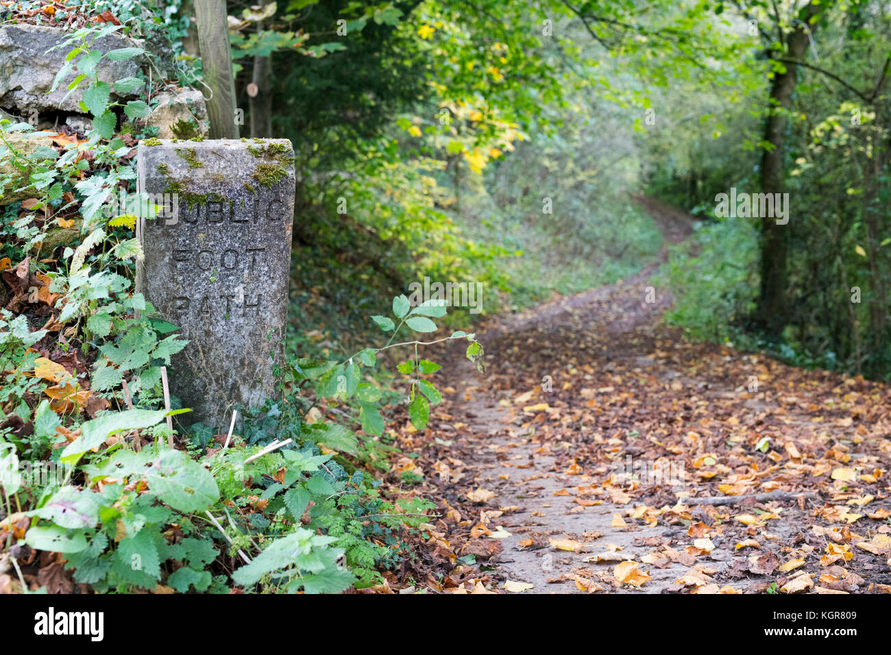Stone public footpath marker in Snowshill, Cotswolds, Gloucestershire, England Stock Photo