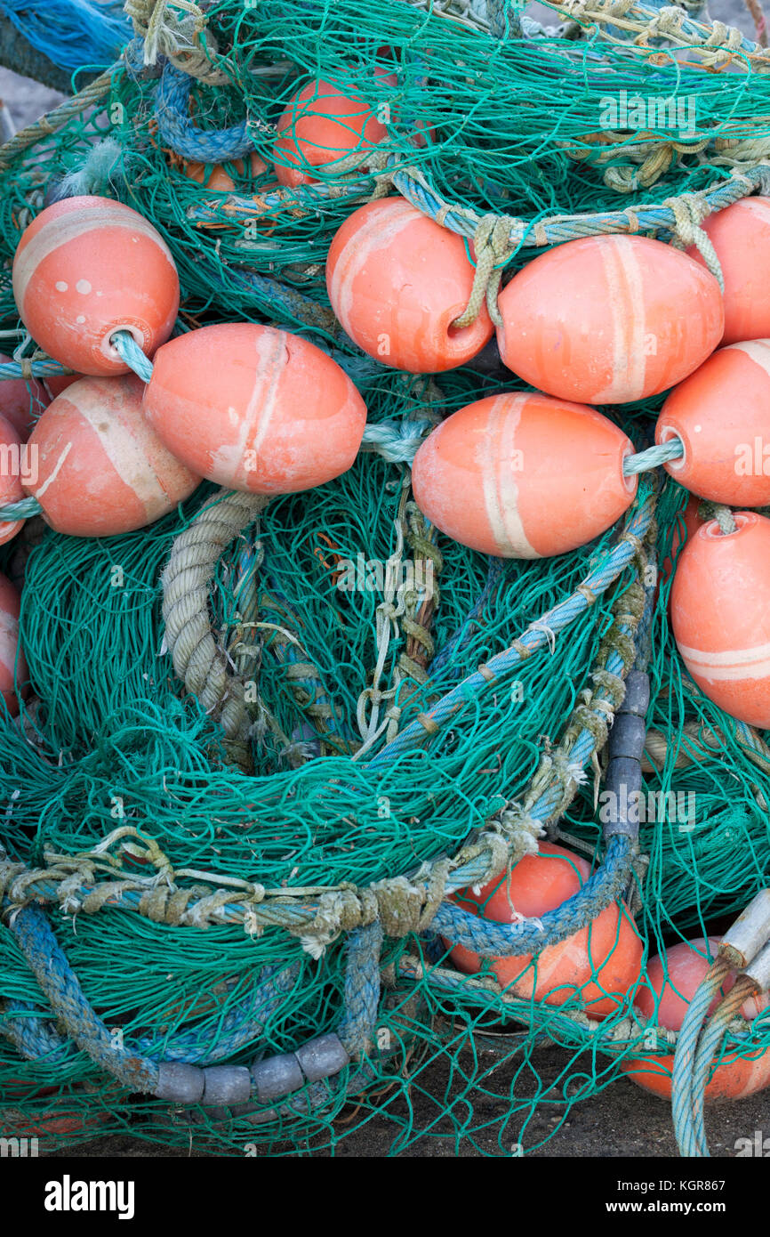Green fishing nets with orange floats on quayside, Gilleleje, Zealand,  Denmark, Europe Stock Photo - Alamy