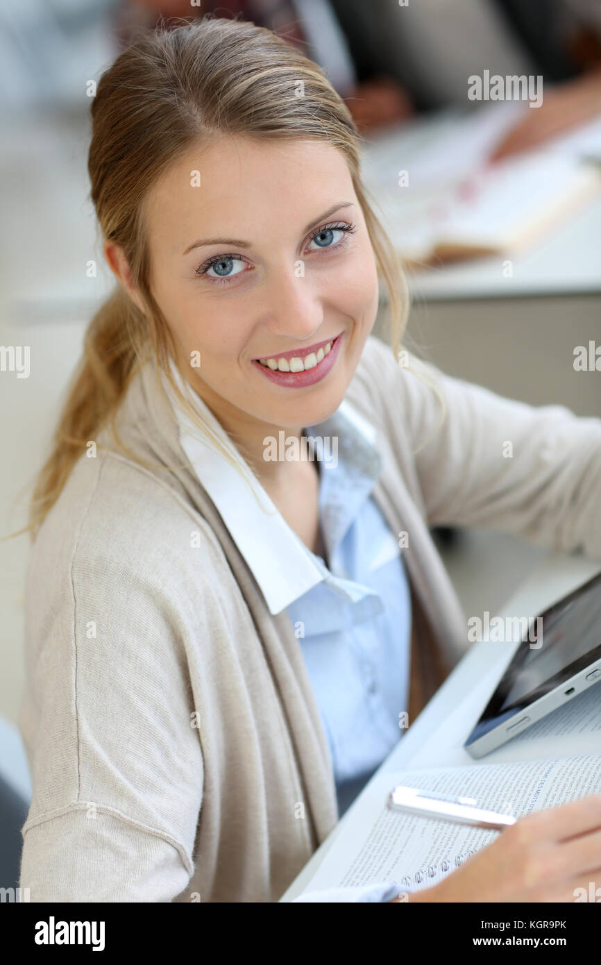 College girl studying with digital tablet Stock Photo