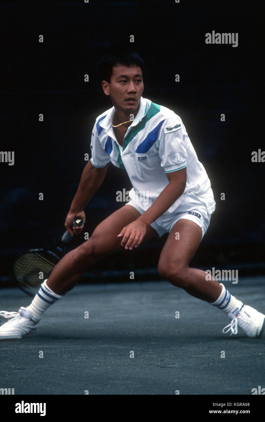 Michael Chang watching the ball after being pulled wide for a forheand during a match at the World Championship Tennis event in Forest Hills, New York, 1989. Stock Photo