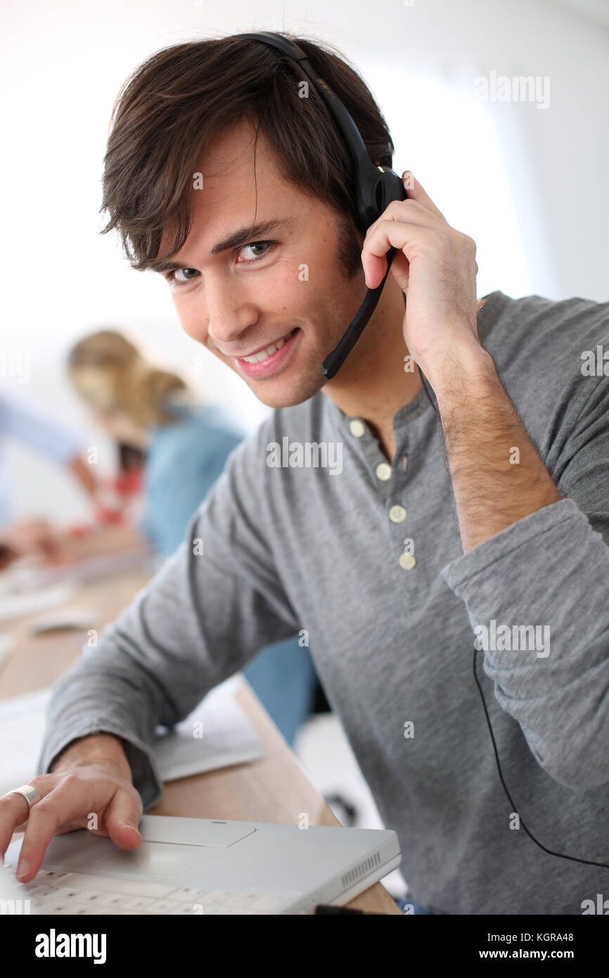 Student with headset on doing English language test Stock Photo Alamy