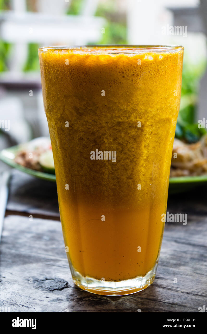 Typical medicine tamarind & turmeric juice in Indonesia Stock Photo