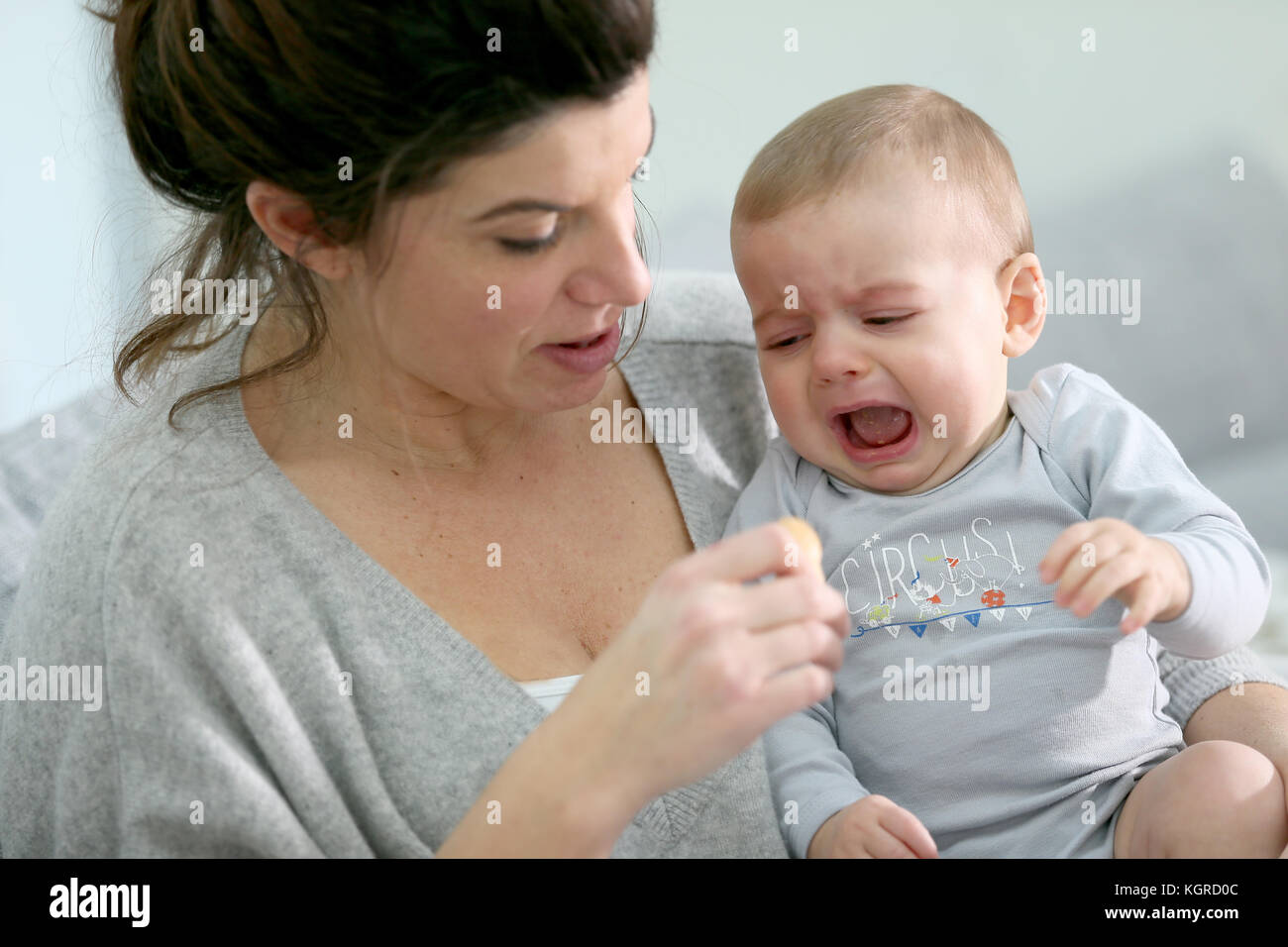 Baby boy crying to have food Stock Photo