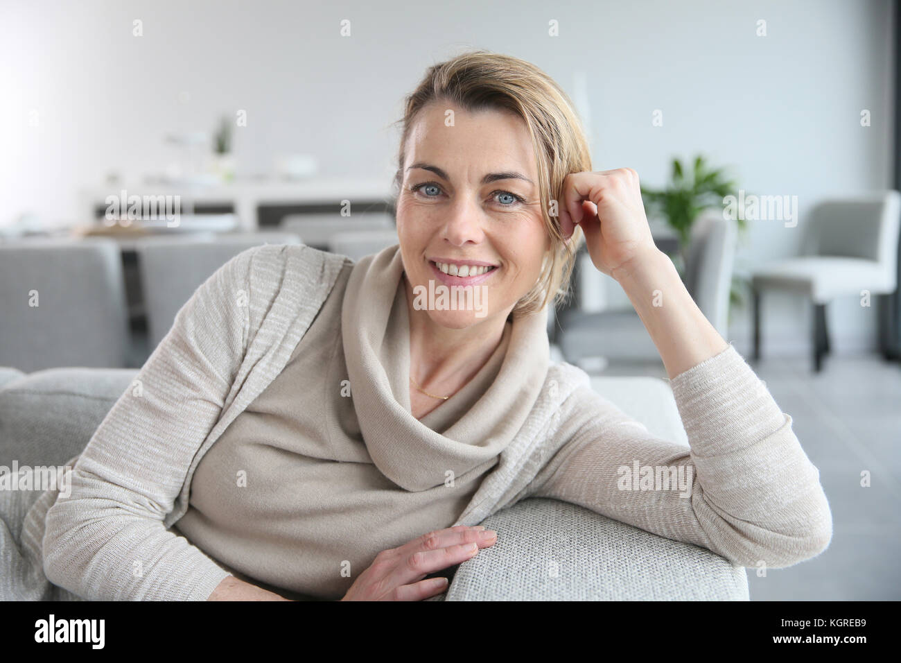 Portrait Of Mature Smiling Blond Woman Stock Photo - Alamy