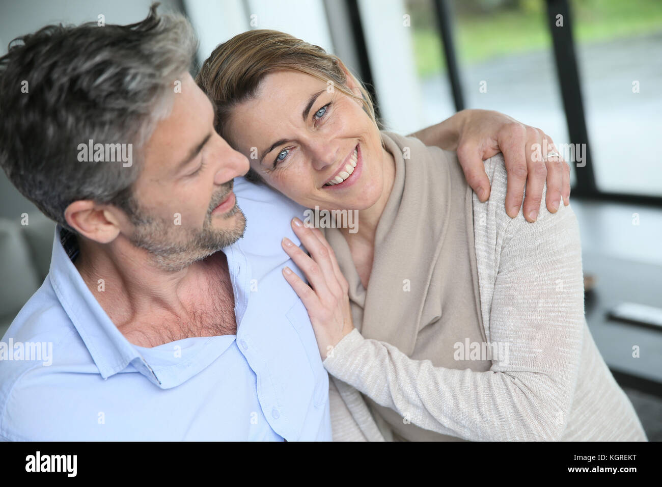 Portrait of mature couple relaxing at home Stock Photo - Alamy