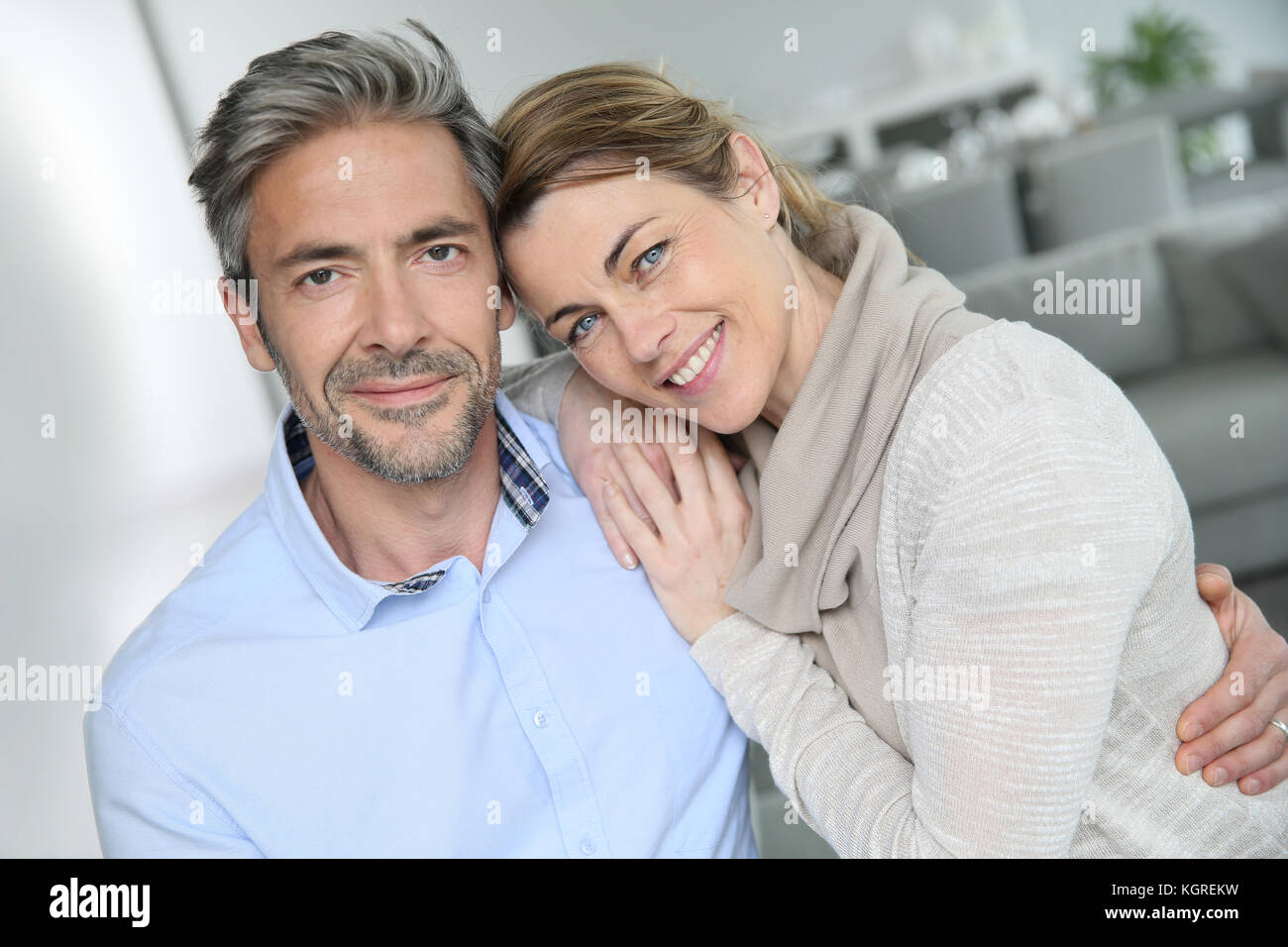 Portrait of mature couple relaxing at home Stock Photo - Alamy