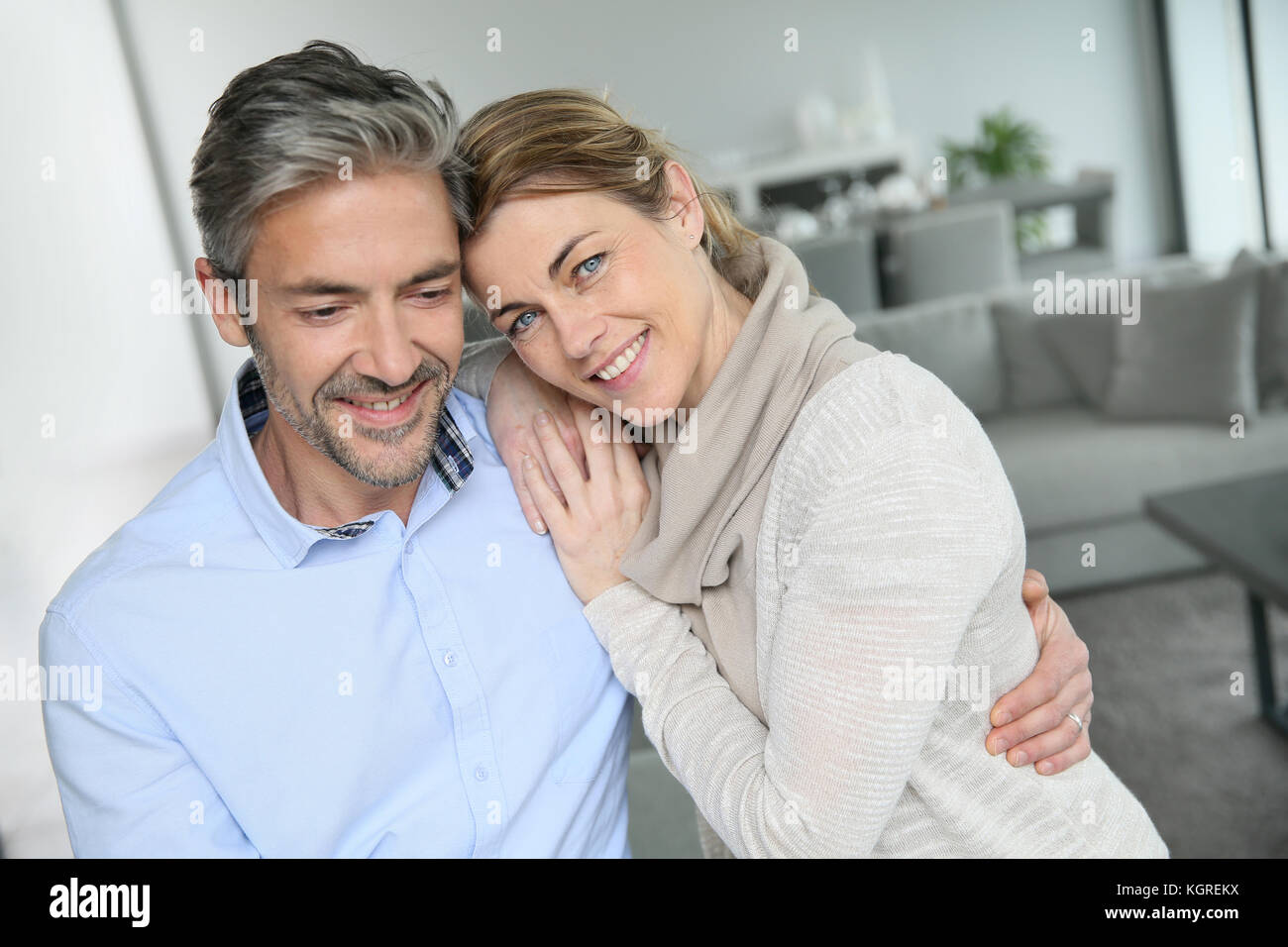 Portrait of mature couple relaxing at home Stock Photo - Alamy