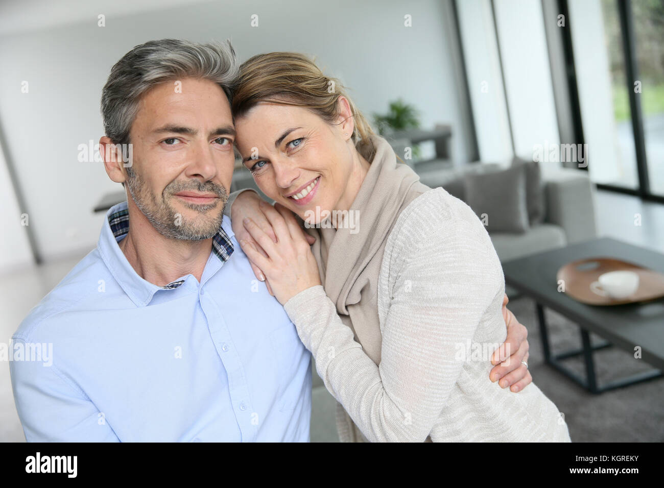Portrait of mature couple relaxing at home Stock Photo - Alamy