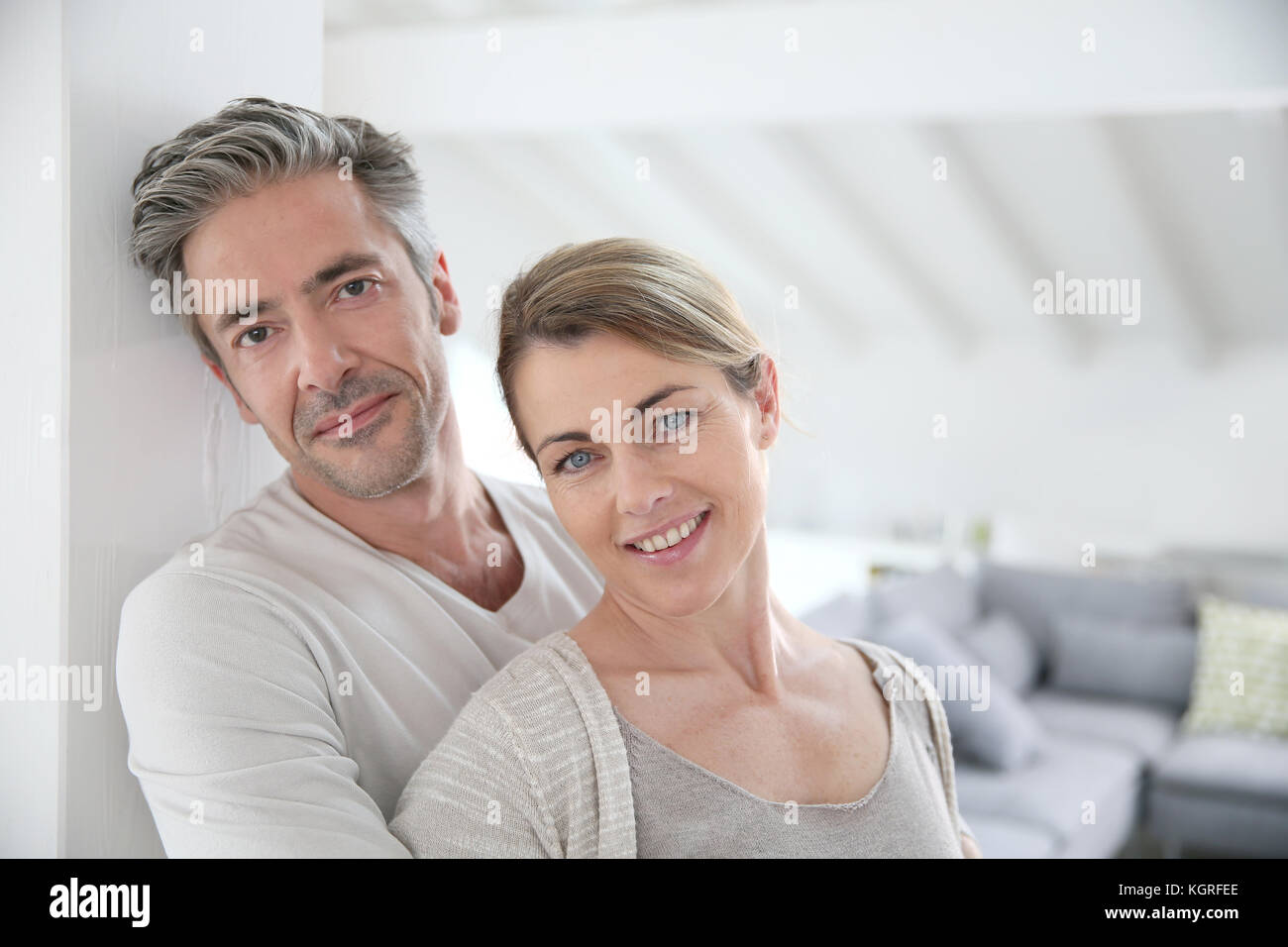 Portrait of mature couple relaxing at home Stock Photo - Alamy