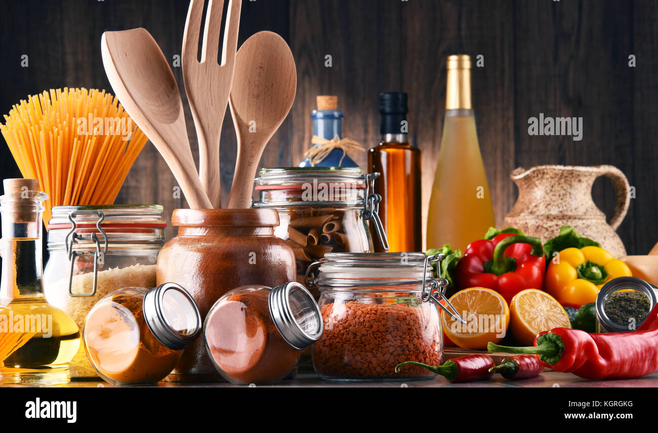 Composition with assorted food products and kitchen utensils on the table Stock Photo