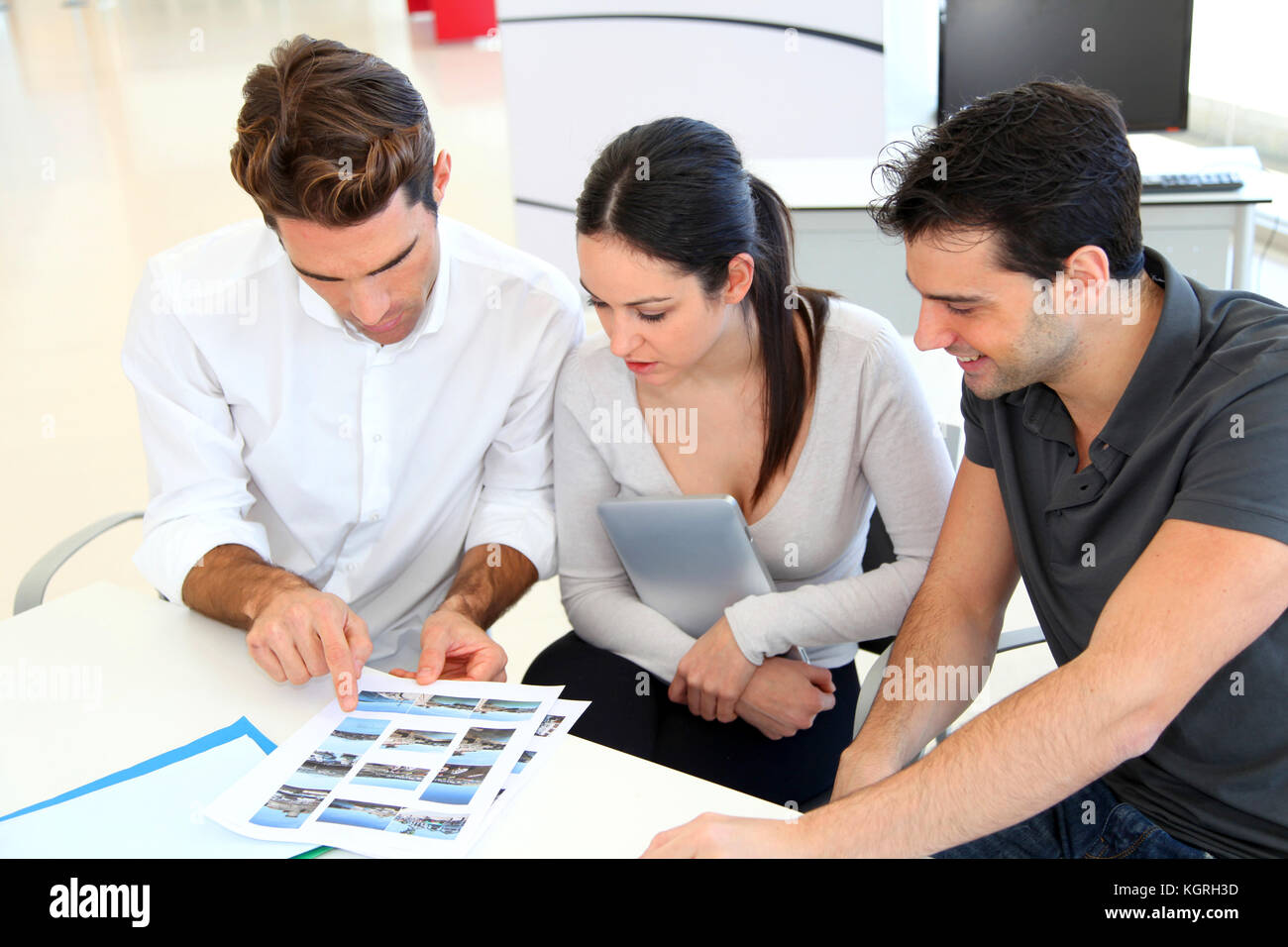 Work meeting in photo agency Stock Photo - Alamy
