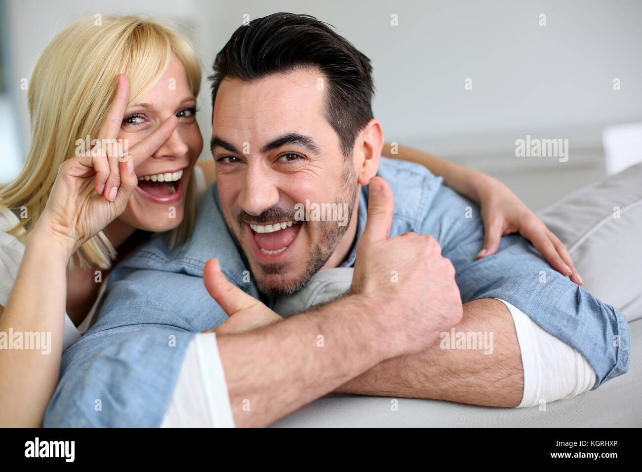 Aged couple showing thumbs up hi-res stock photography and images - Alamy