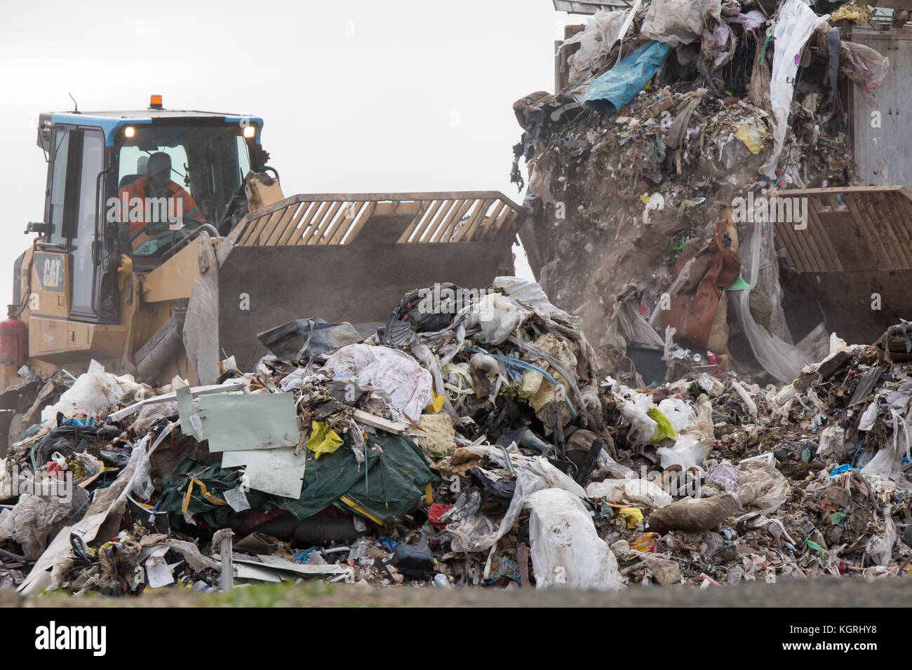 Tractor moving rubbish at Milton Tip near Cambridge Stock Photo Alamy