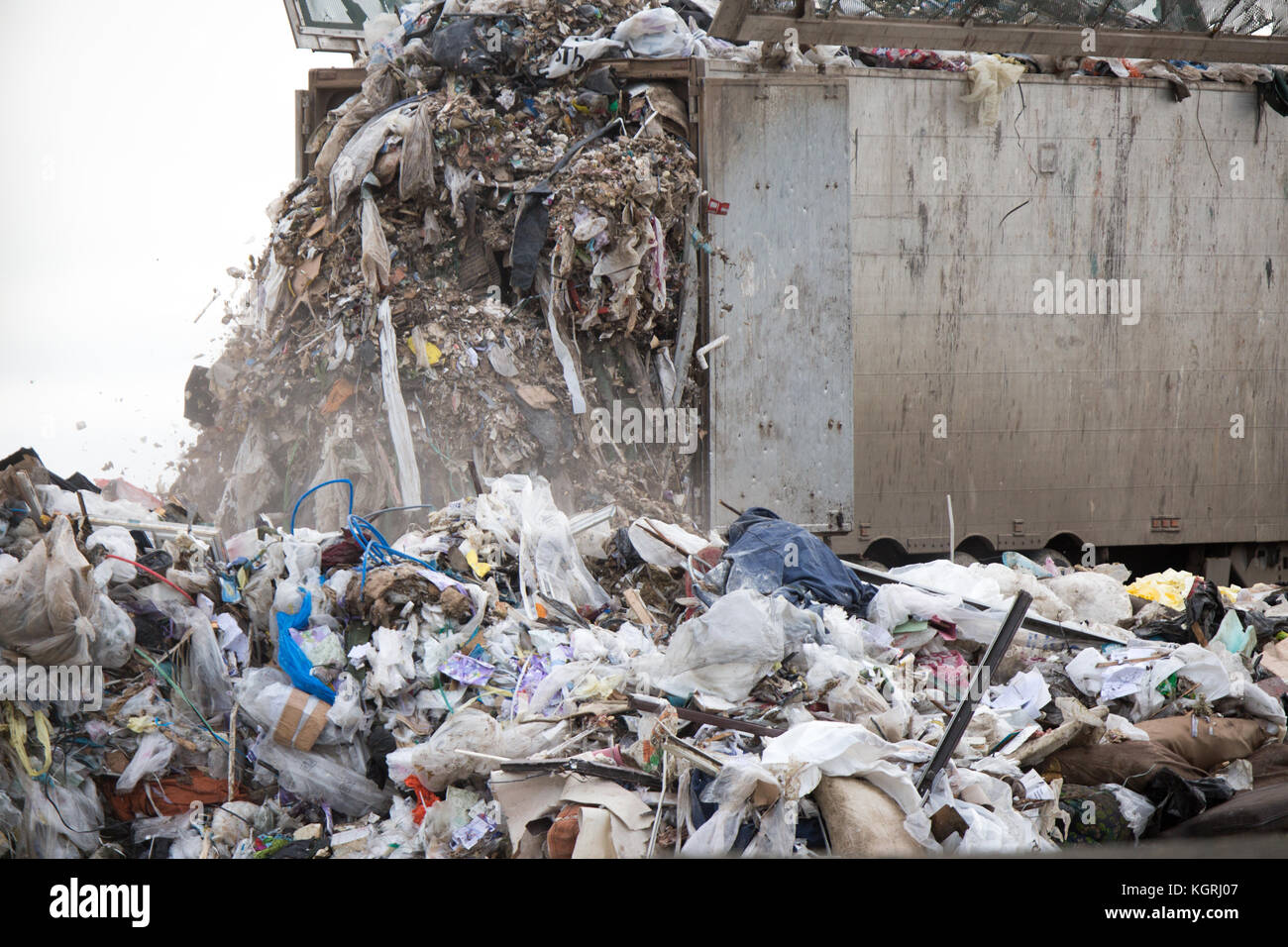 Tractor moving rubbish at Milton Tip near Cambridge Stock Photo Alamy