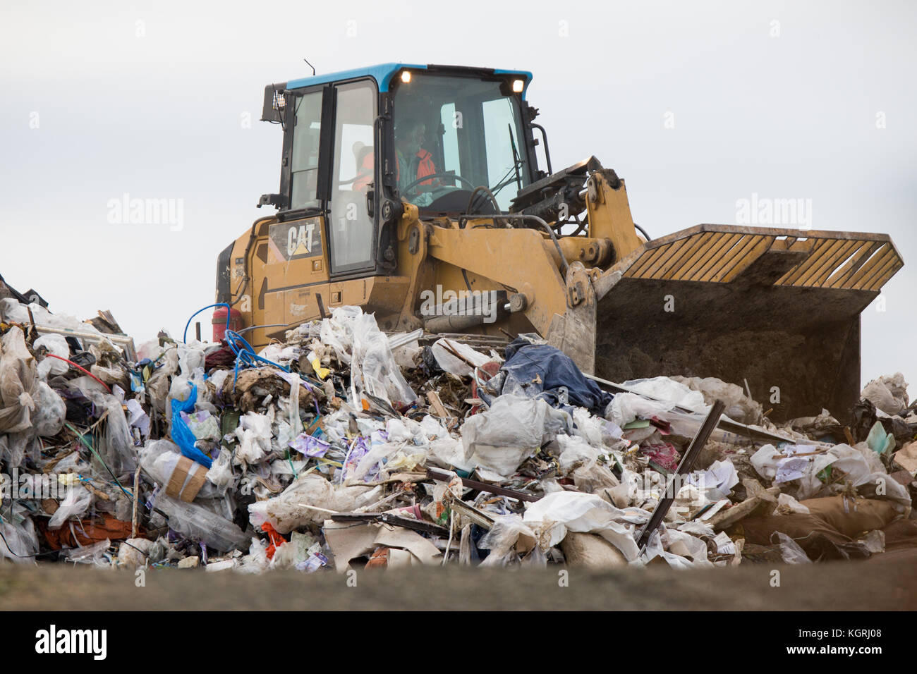 Tractor moving rubbish at Milton Tip near Cambridge Stock Photo - Alamy