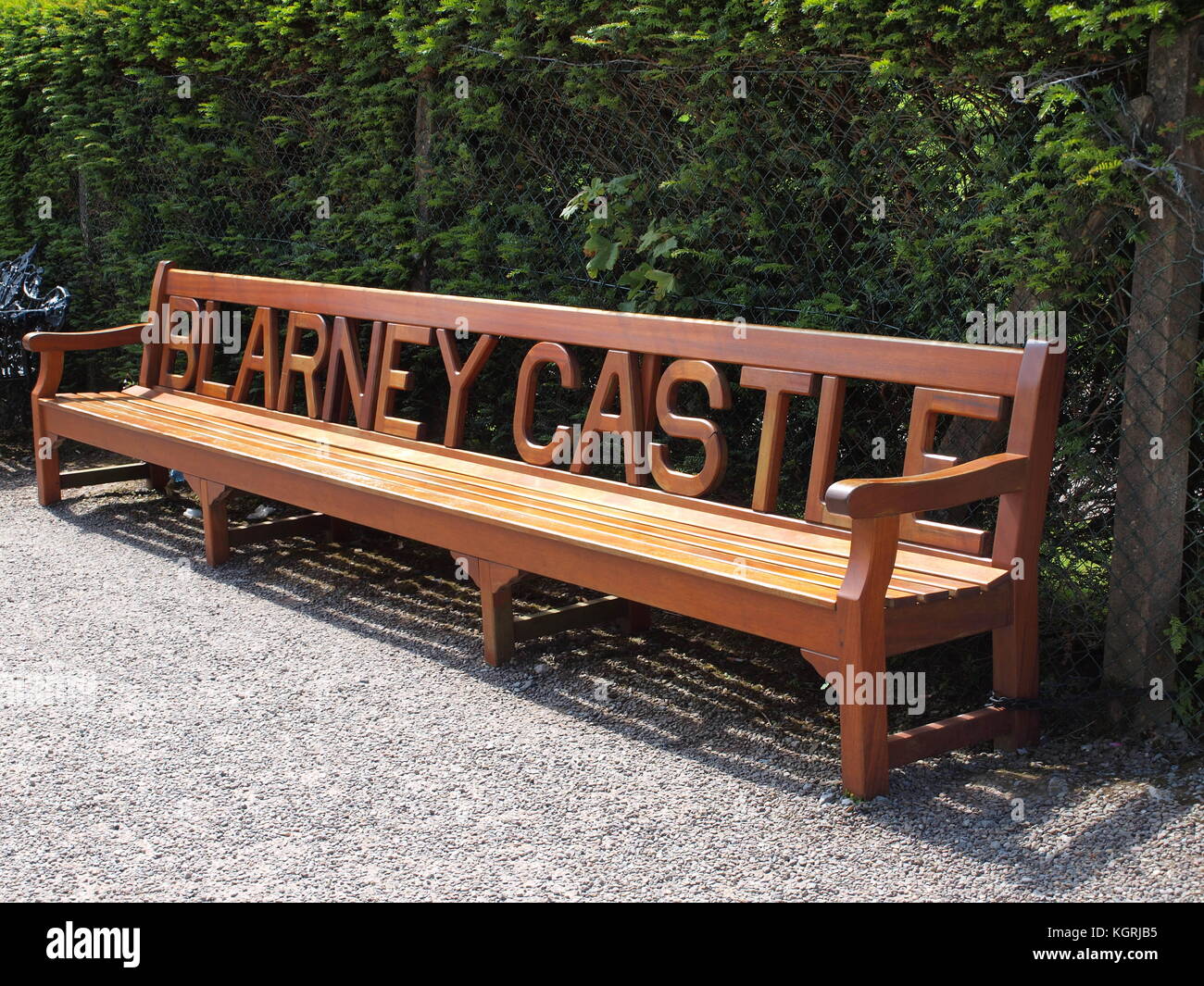 Carved wooden bench at Blarney Castle, County Cork, Ireland Stock Photo