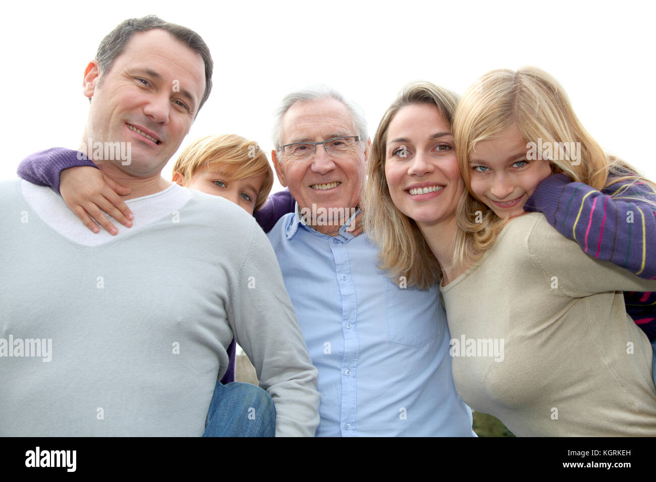Family portrait standing outside Stock Photo - Alamy