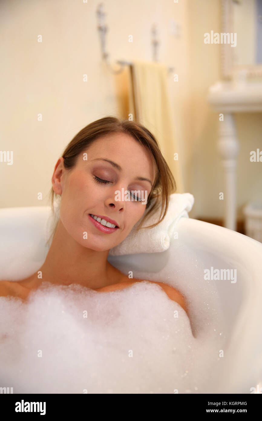 Woman relaxing in bathtub Stock Photo Alamy