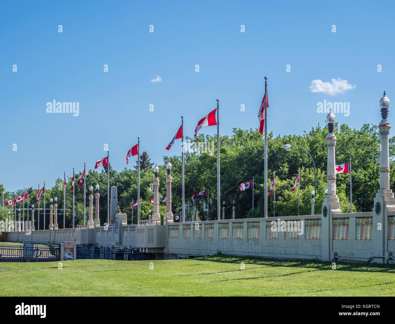Bridge, dams and flags,  Wascana Lake, Regina, Saskatchewan, Canada. Stock Photo