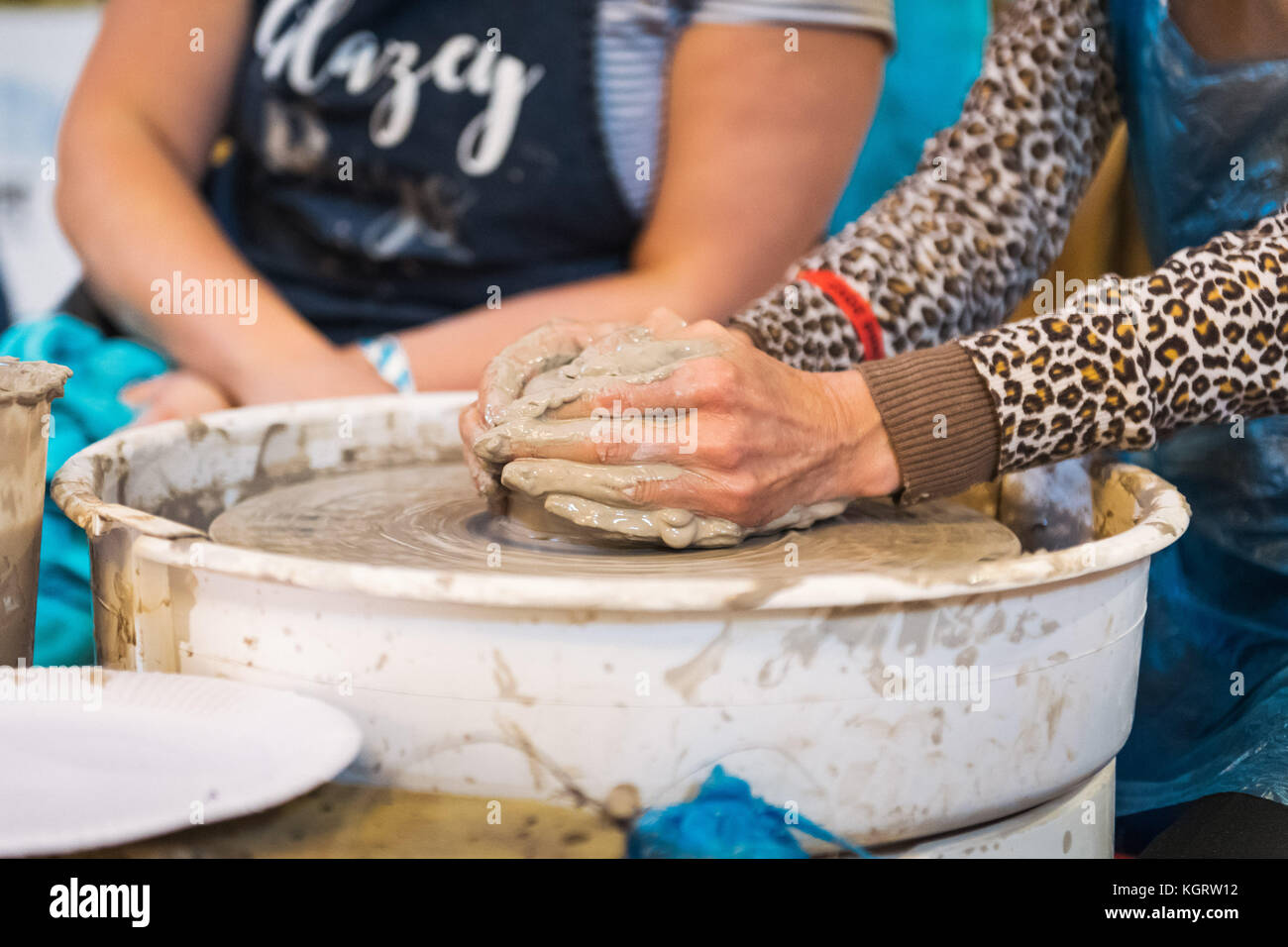 A woman's hands throwing a clay pot Stock Photo Alamy