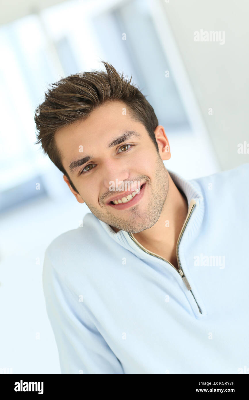Portrait of young smiling man Stock Photo - Alamy