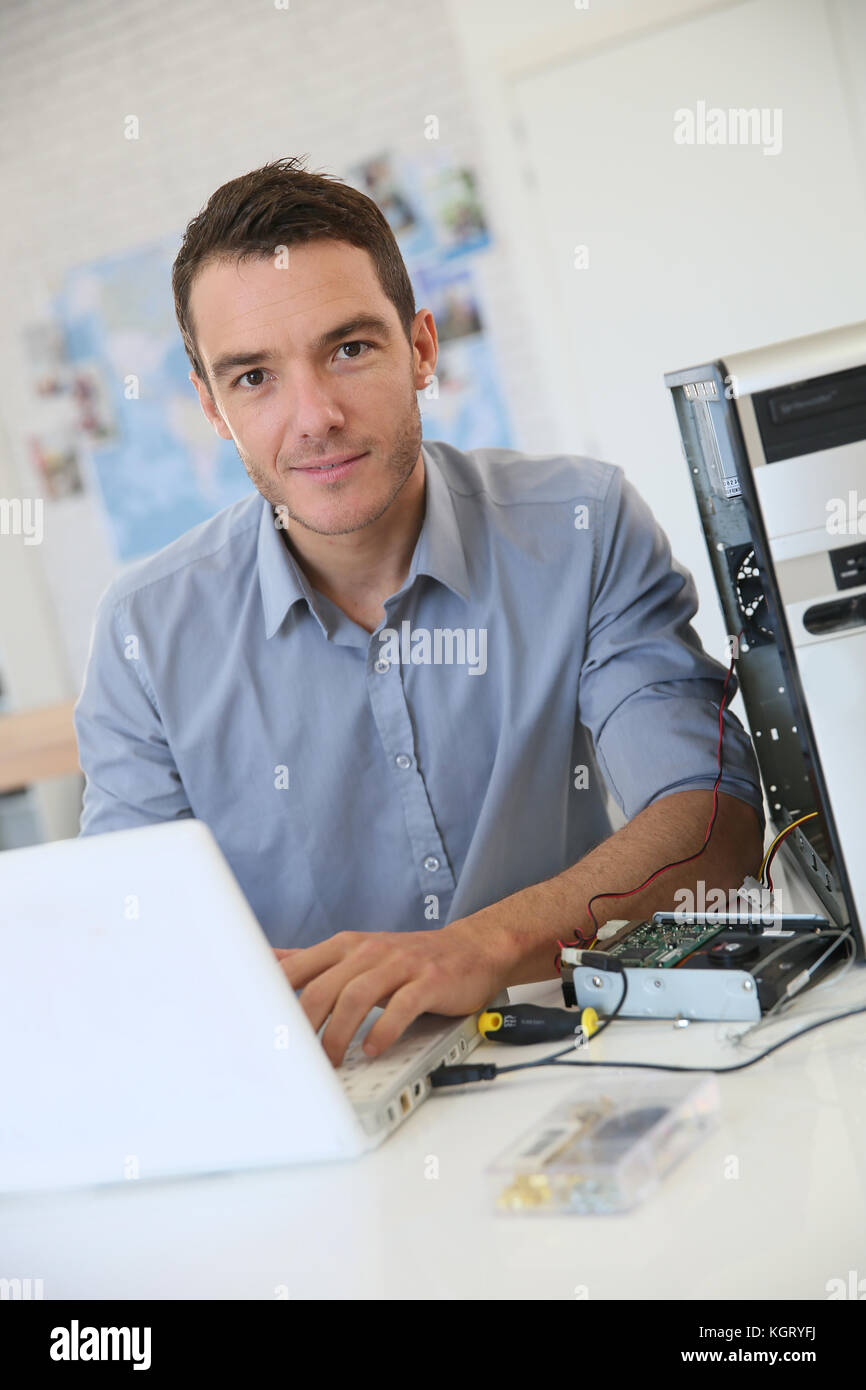 Engineer proceeding to data recovery from computer Stock Photo