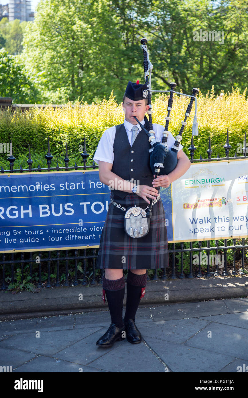 EDINBURGH SCOTLAND May 26th 2017 Edinburgh street bagpiper at Nor