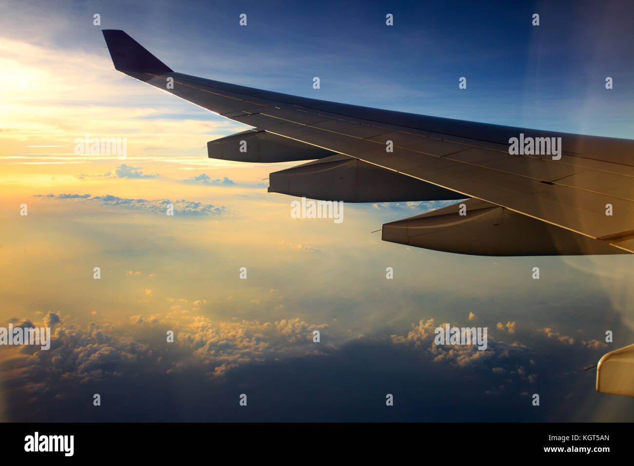 Close up of a airplane wing at sunset Stock Photo