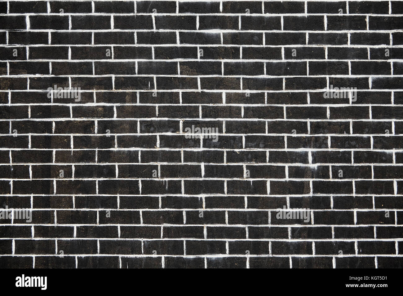 Old dark brick wall texture or background Stock Photo - Alamy