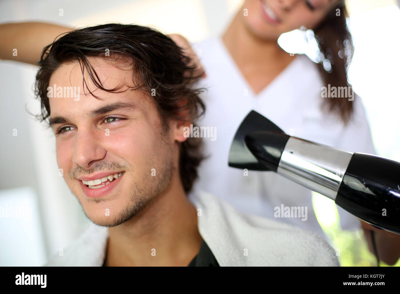 Young Man In Beauty Salon Having His Hair Dried Stock Photo Alamy