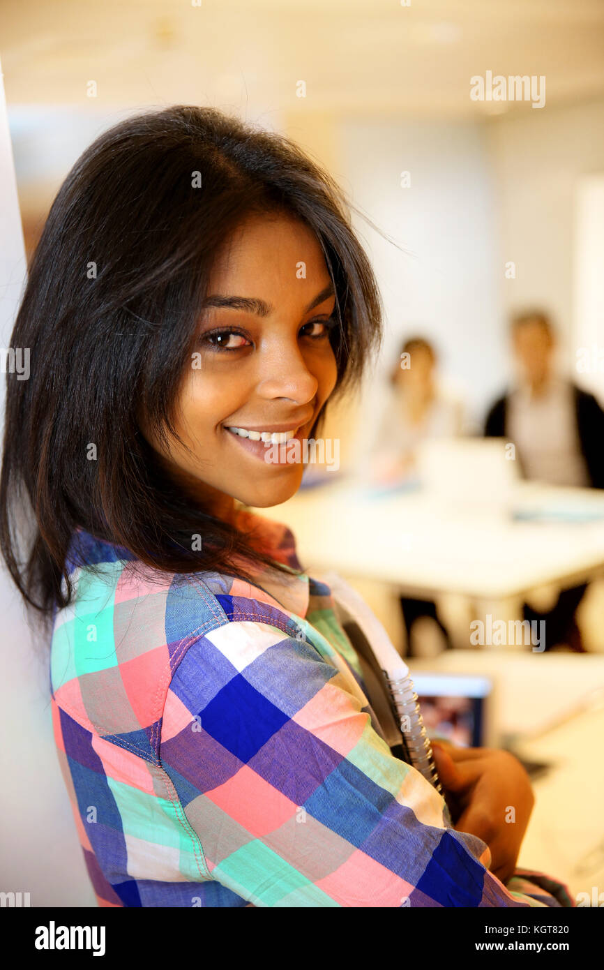 Portrait of smiling student girl Stock Photo - Alamy