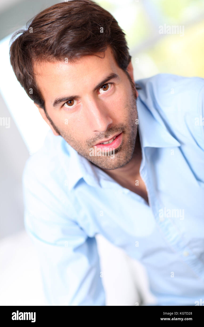Latino boy smiling blue shirt hi-res stock photography and images - Alamy