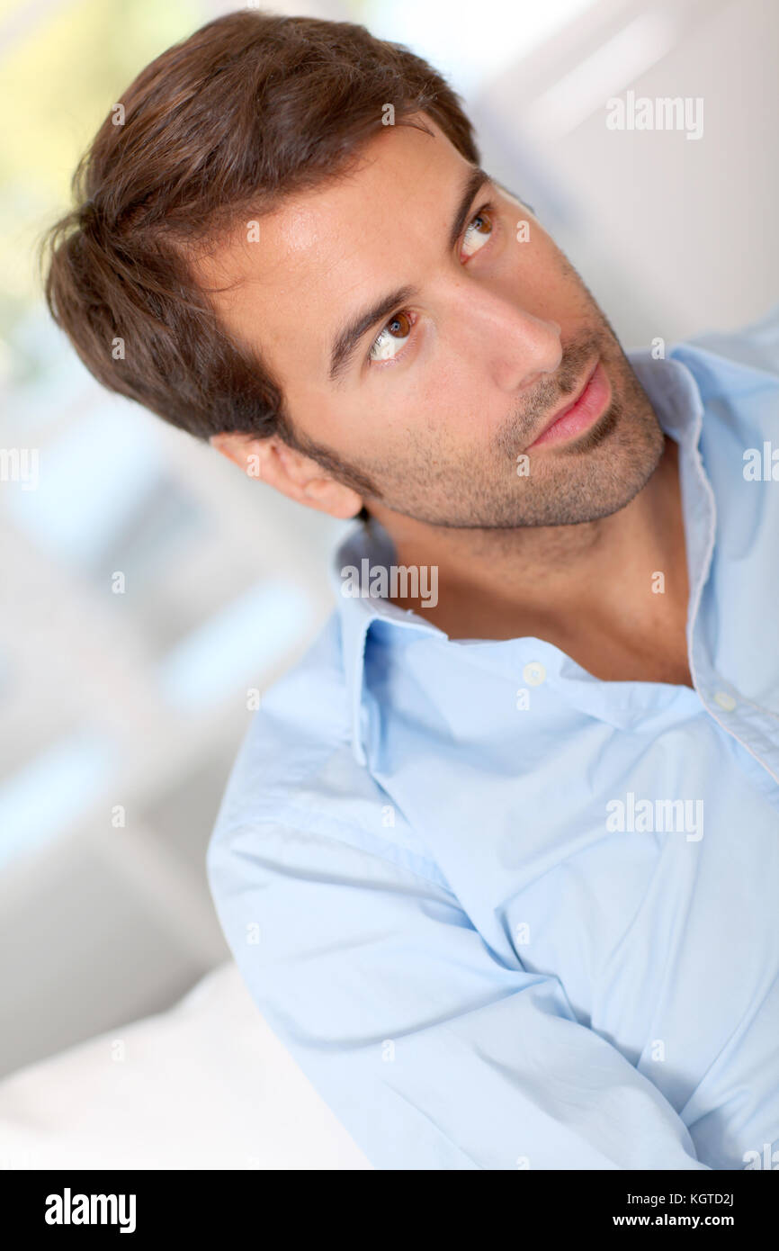 Latino boy smiling blue shirt hi-res stock photography and images - Alamy