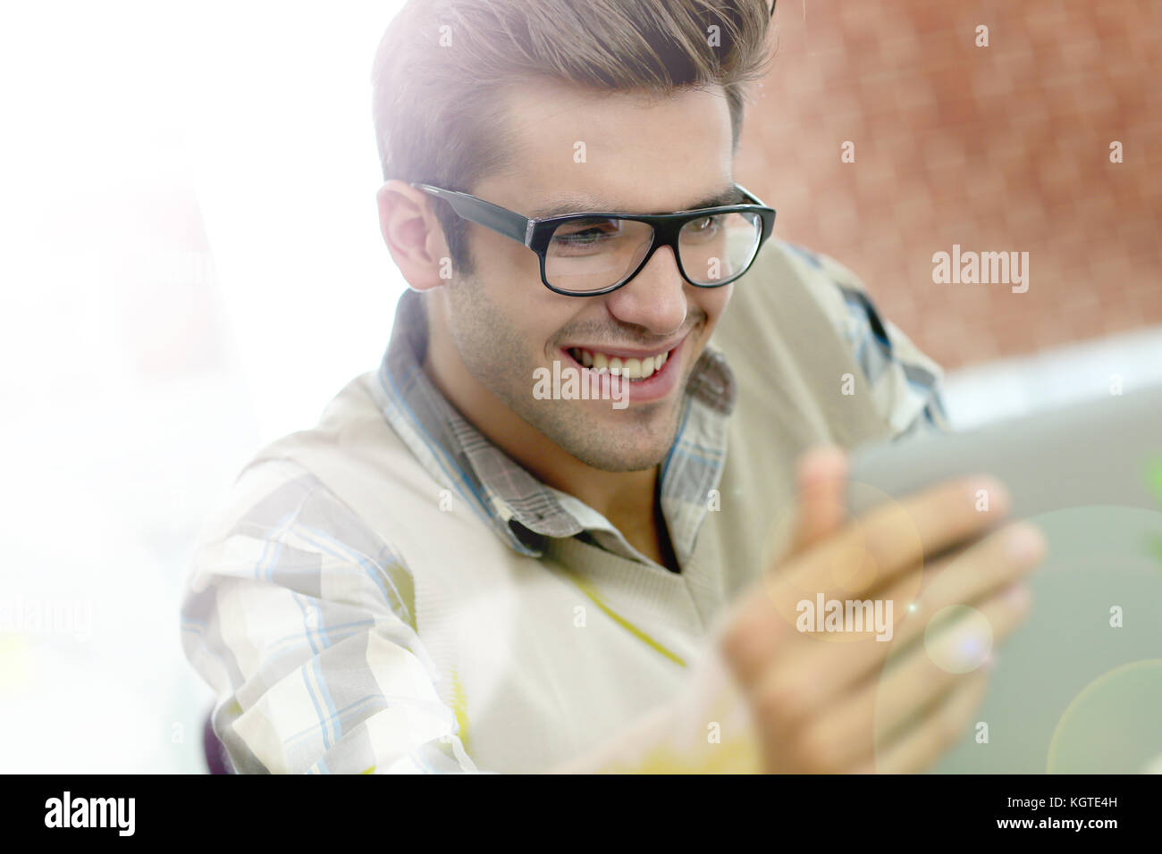 Young man with eyeglasses in training class Stock Photo Alamy