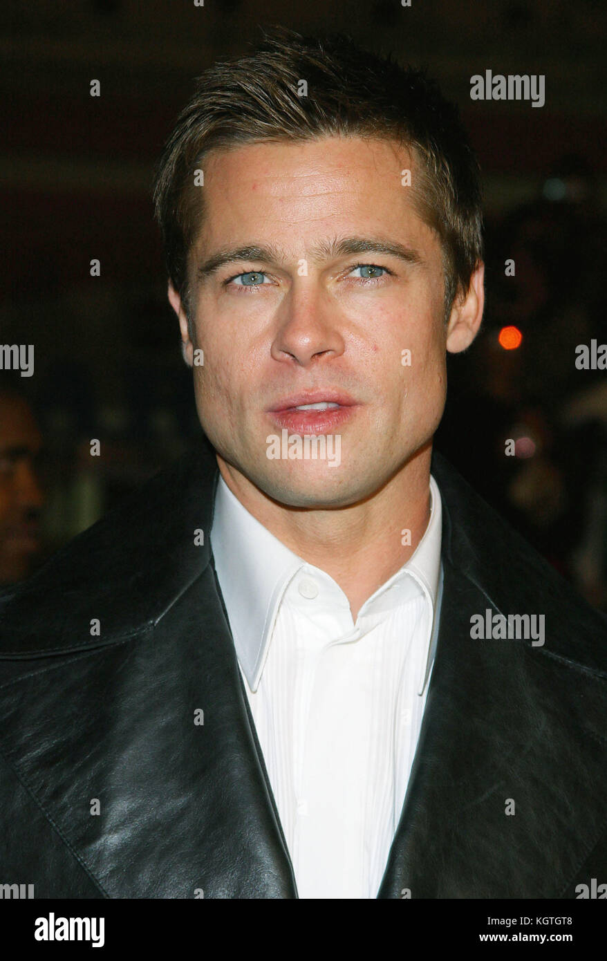 Brad Pitt arriving at the 'Ocean's 12' Premiere held at Grauman's Chinese Theatre in Los Angeles on Wednesday, December 8, 2004.Brad Pitt -  = People,  Three quarters, Premiere, Awards show,  Arrival, Red Carpet Event, Vertical, Smiling, Film Industry,  USA, Movie actor, movie celebrity, Artist, Celebrity, Looking At Camera, Photography, Arts Culture and Entertainment,  Attending an event,  Bestof, One Person, Stock Photo