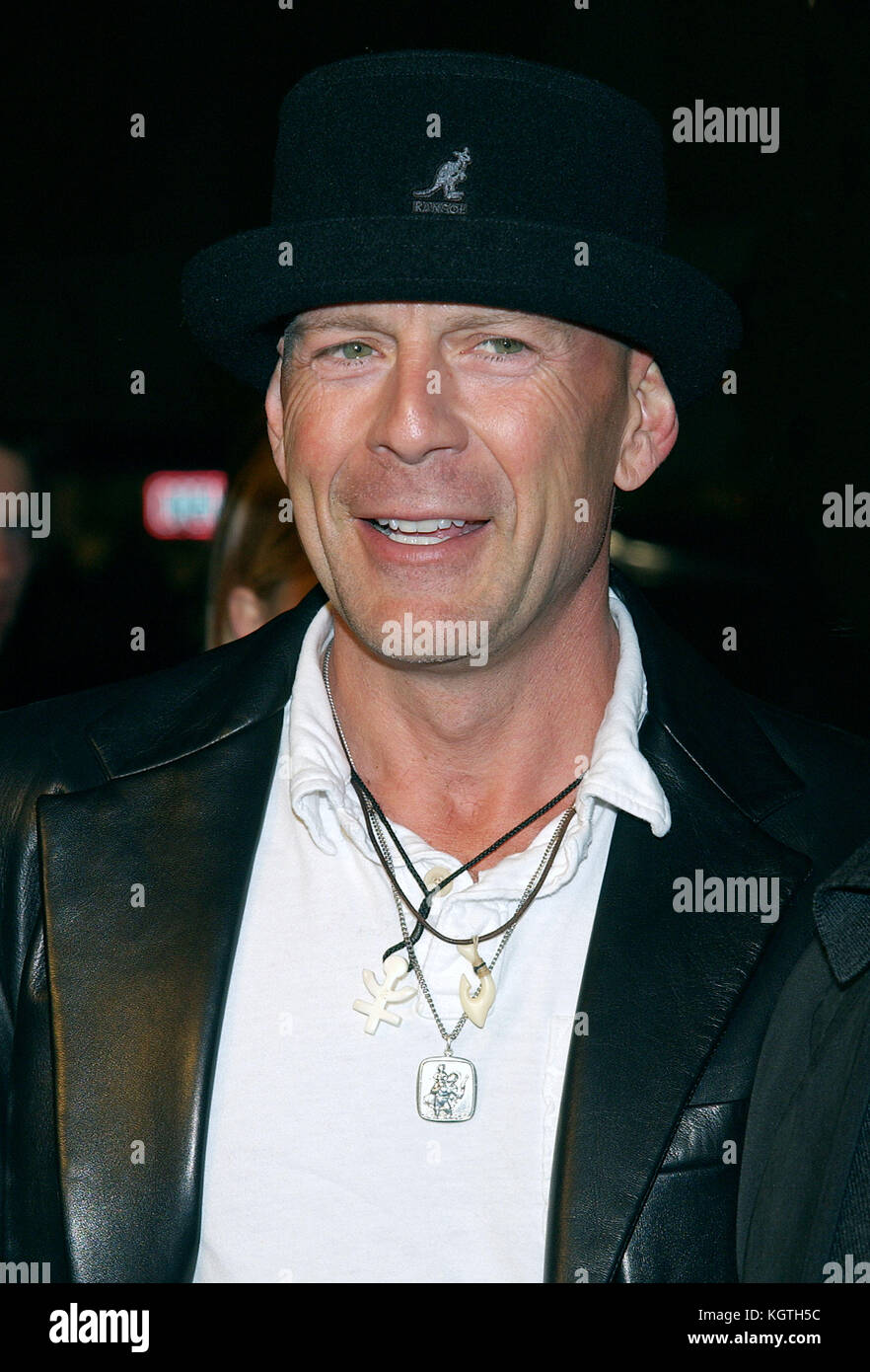 Bruce Willis arriving the  'Tears of The Sun Premiere' at the Westwood Village in Los angeles. March 3, 2003.Bruce Willis -  = People,  , Headshot, , Premiere, Awards show,  Arrival, Red Carpet Event, Vertical, Smiling, Film Industry,  USA, Movie actor, movie celebrity, Artist, Celebrity, Looking At Camera, Photography, Arts Culture and Entertainment,  Attending an event,  Bestof, One Person, Stock Photo