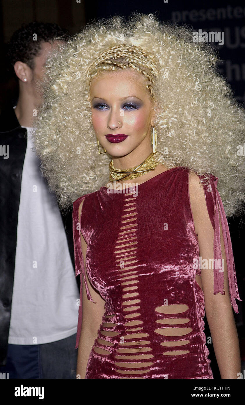 Christina Aguilera arriving at the 7th Annual Blockbuster Entertainment Awards  at the Shrine Auditorium in Los Angeles  4/10/2001 Christina Aguilera -  = People,  , Headshot, , Premiere, Awards show,  Arrival, Red Carpet Event, Vertical, Smiling, Film Industry,  USA, Movie actress, movie celebrity, Artist, Celebrity, Looking At Camera, Photography, Arts Culture and Entertainment,  Attending an event,  Bestof, One Person, Singer, musician, musical artist Christina Aguilera -  = People,  , Headshot, , Premiere, Awards show,  Arrival, Red Carpet Event, Vertical, Smiling, Film Industry,  USA, Mov Stock Photo