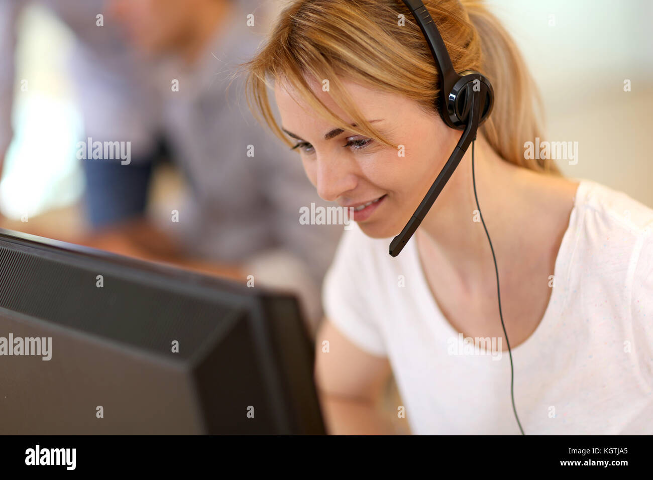 Portrait of sales service operator Stock Photo - Alamy