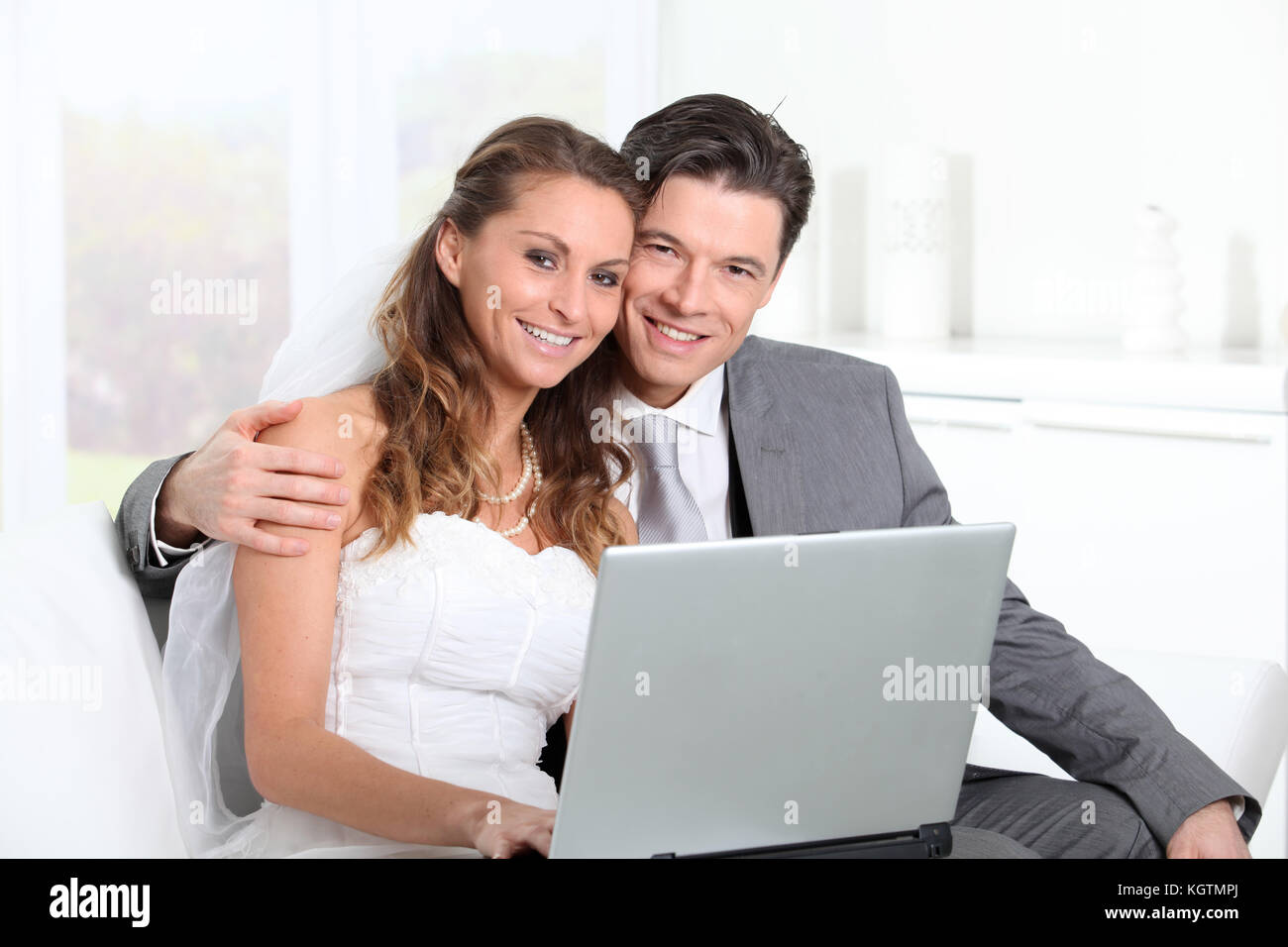 Bride sitting on couch hi-res stock photography and images - Alamy