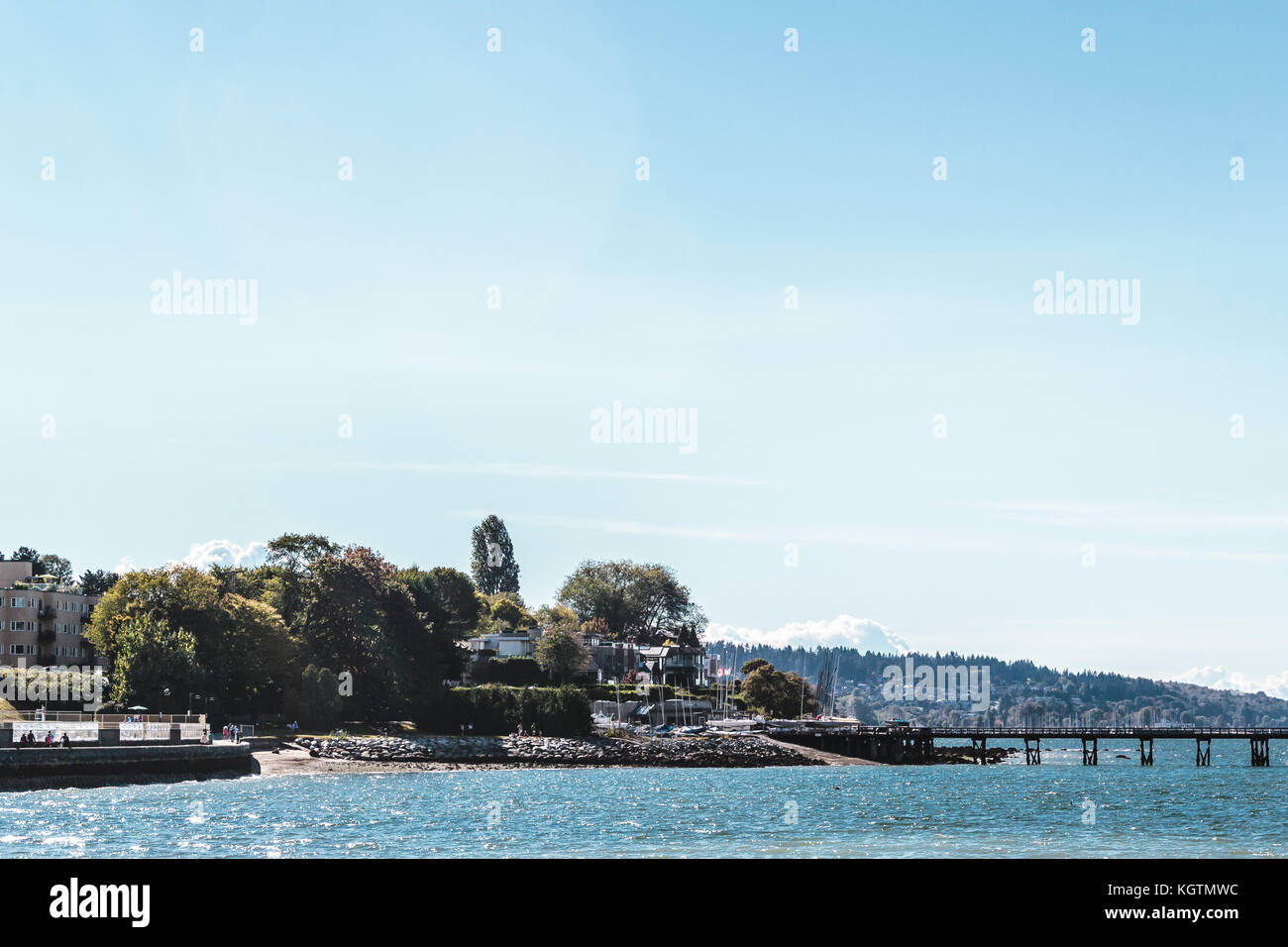 Photo of Trees and Houses at Kitsilano Beach in Vancouver, Canada Stock Photo