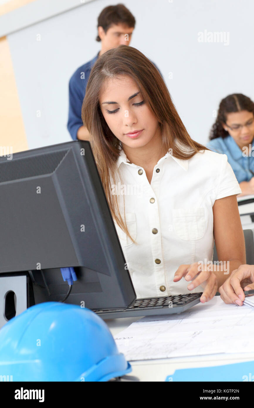 Student in class working on computer Stock Photo - Alamy