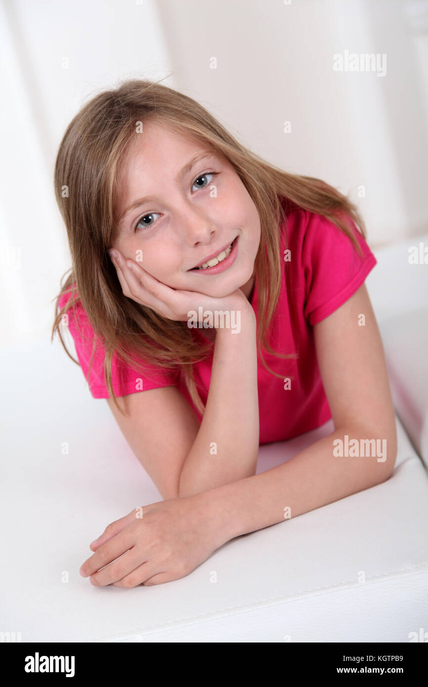 Portrait of smiling blond girl Stock Photo - Alamy