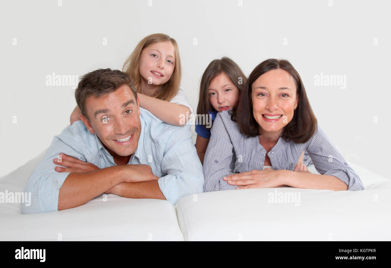 Family Of 4 People Laying Down Couch Stock Photo 165272459 Alamy