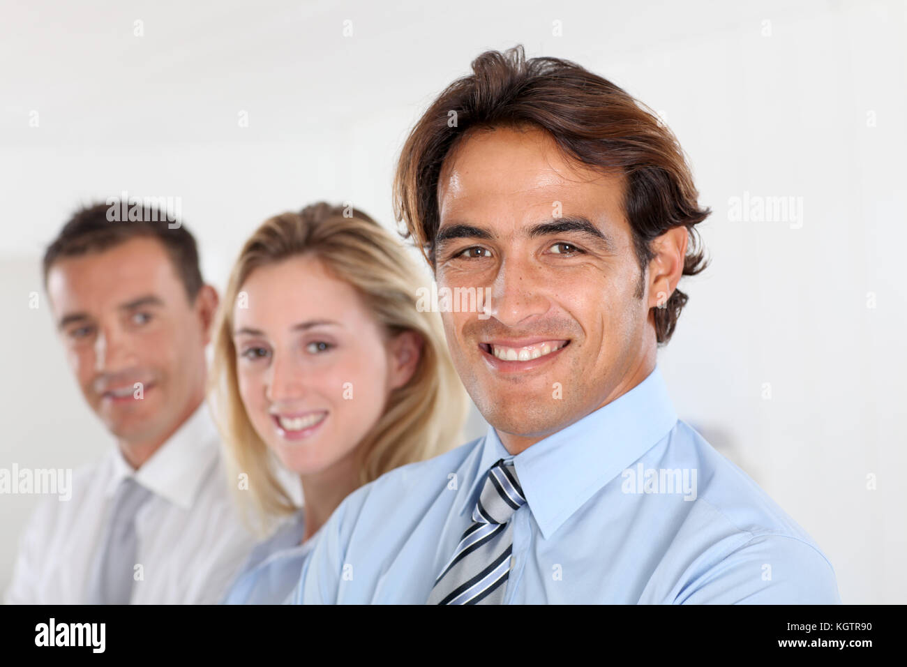 Portrait of smiling business team Stock Photo - Alamy