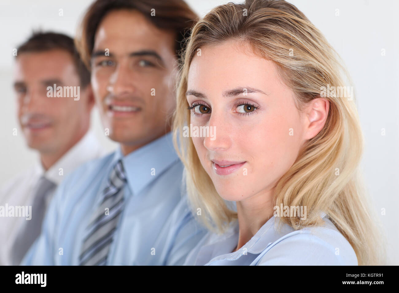 Portrait of smiling business team Stock Photo - Alamy