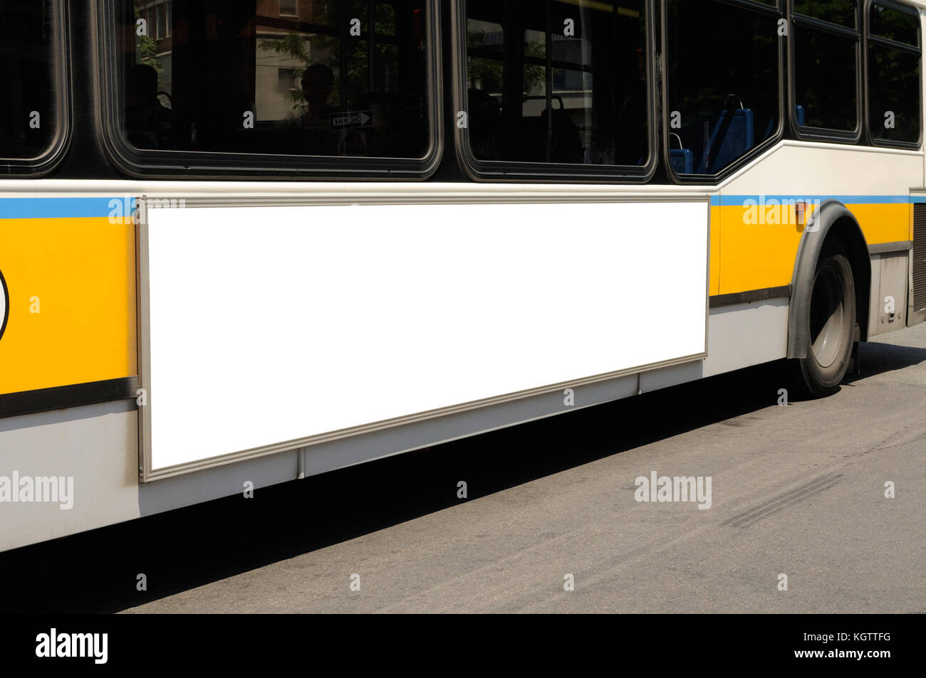 Bus advertising. Blank billboard on bus side panel. Stock Photo