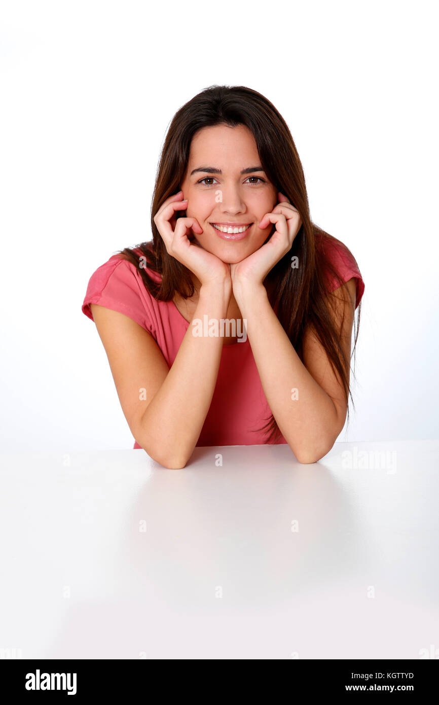 Portrait of smiling girl wearing pink shirt Stock Photo Alamy
