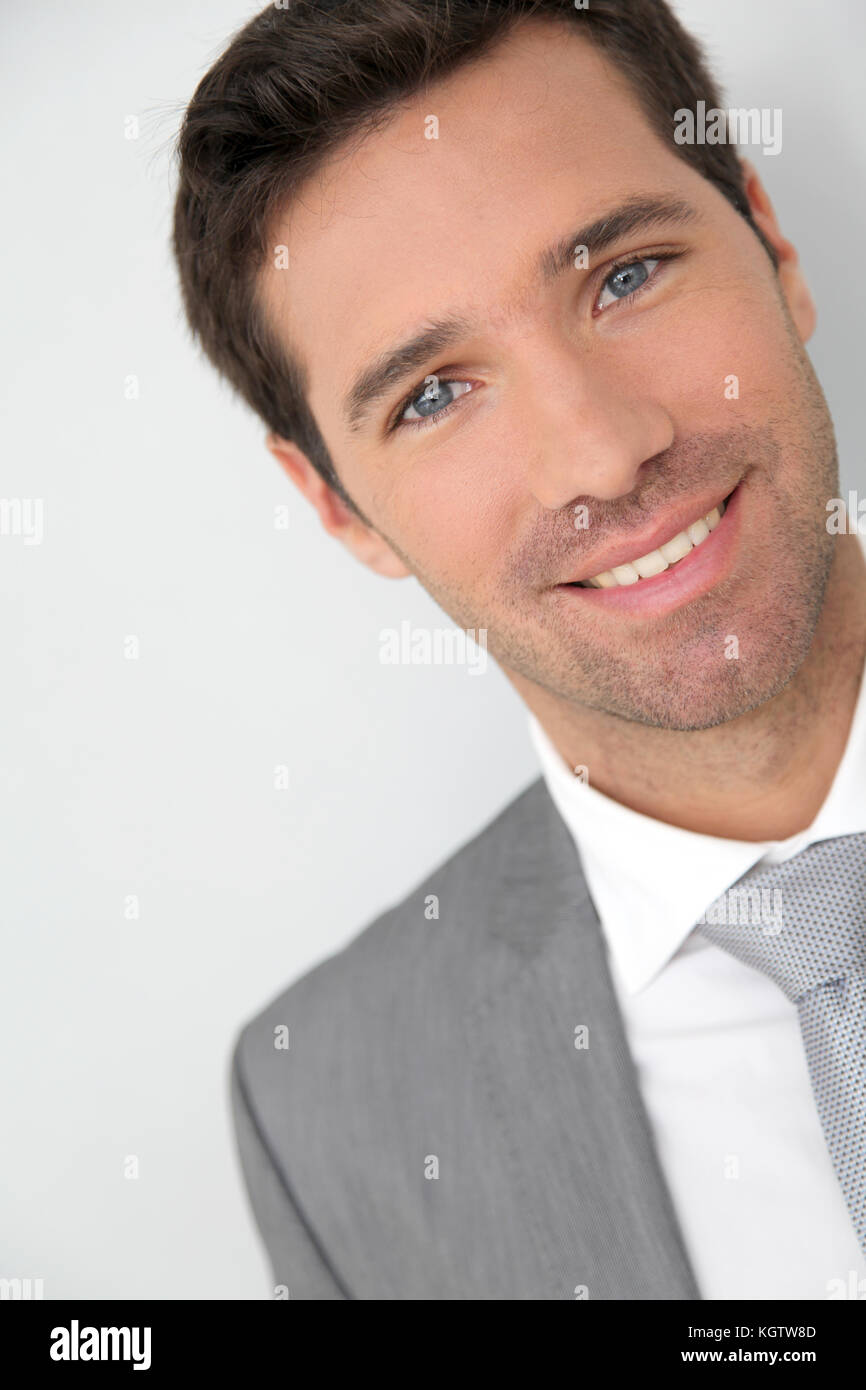 Portrait of smiling businessman Stock Photo - Alamy