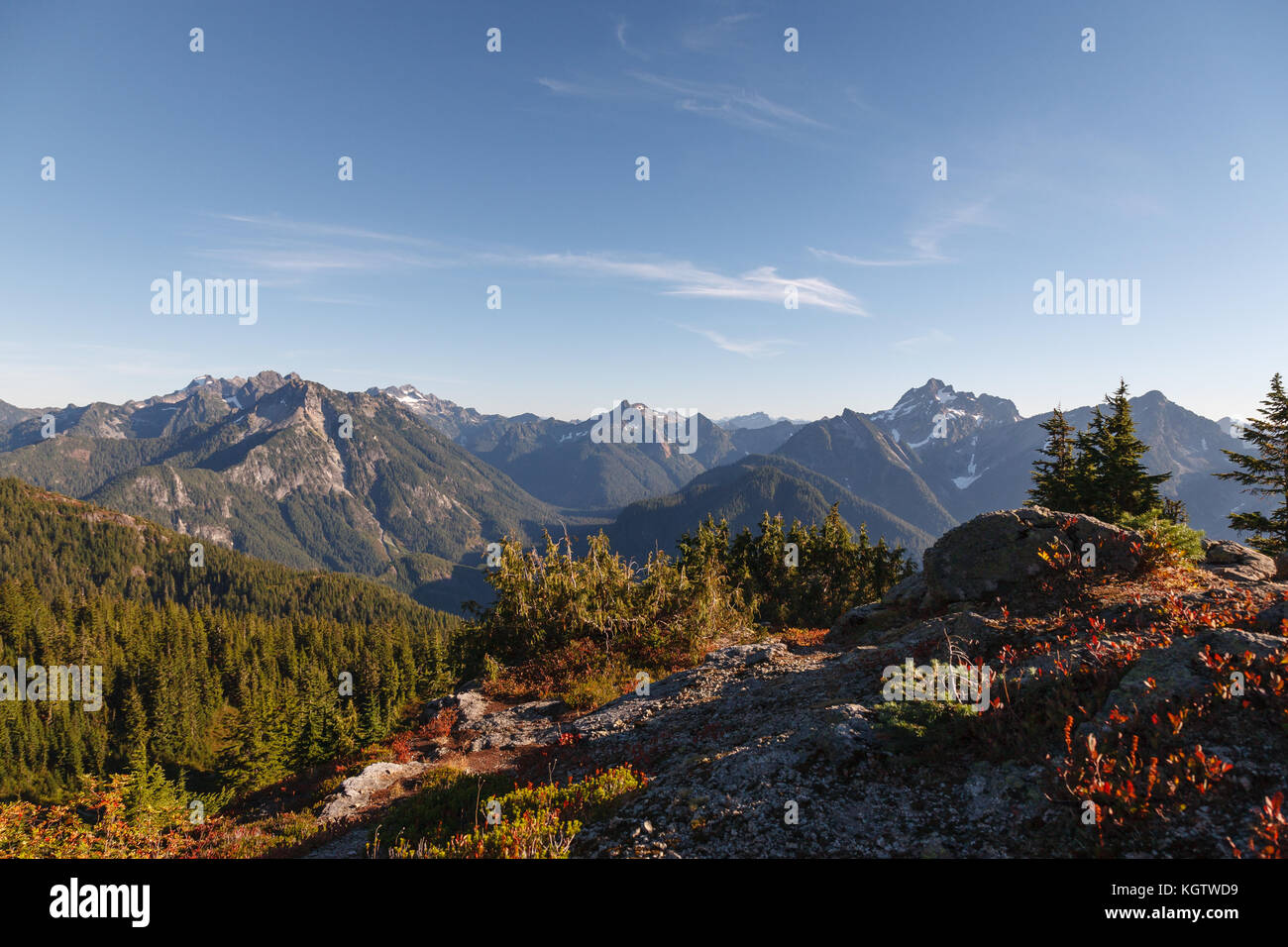 A wide view of the Cascade Mountain Range from a viewpoint along the Mount Dickerman hiking trail. Stock Photo
